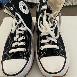 Converse women’s Black and White High-Top Sneakers platform